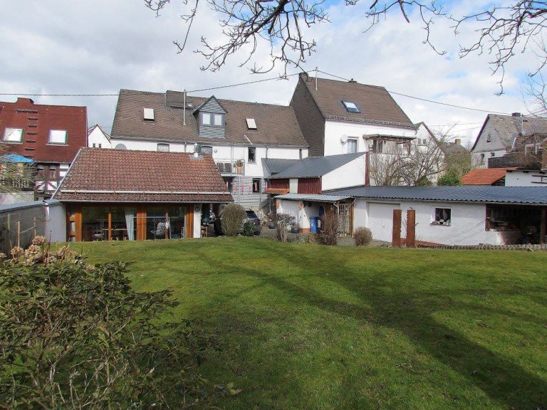 gartenseitige Gesamtansicht Limburg Einfamilienhaus Gelungene Symbiose aus Historie und Moderne - Ortslage von Limburg-Offheim